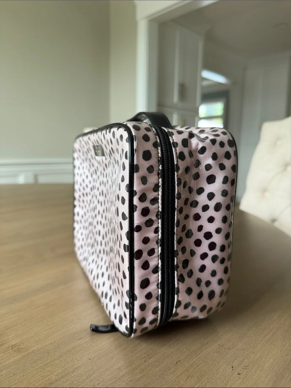 kate spade pink and black spotted cosmetic travel case